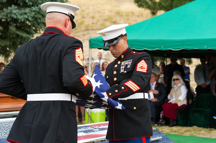 (Alex Gallivan  |  Special to The Tribune) Marine Pfc. Robert K. Holmes, who died 77 years ago aboard the USS Oklahoma during the attack on Pearl Harbor, is laid to rest in the Salt Lake City Cemetery, Monday, Aug. 20, 2018.