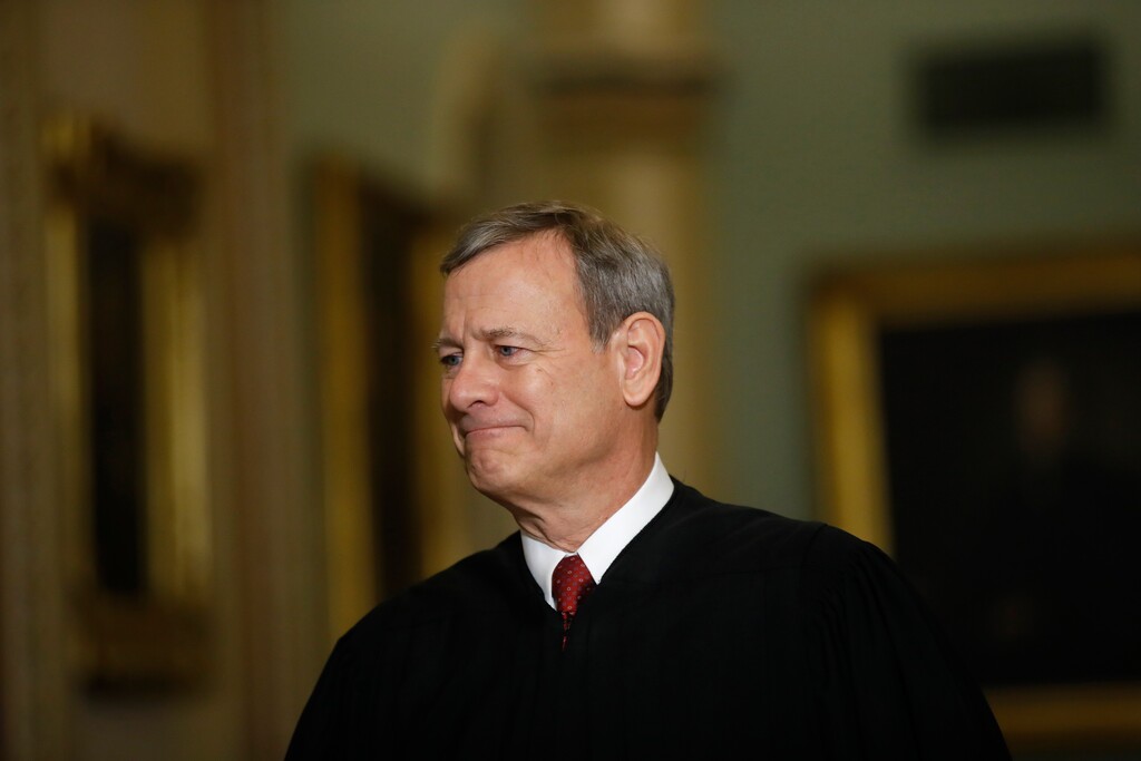 FILE - In this Jan. 16, 2020, file photo Chief Justice of the United States, John Roberts walks to the Senate chamber at the Capitol in Washington. (AP Photo/Matt Rourke, File)