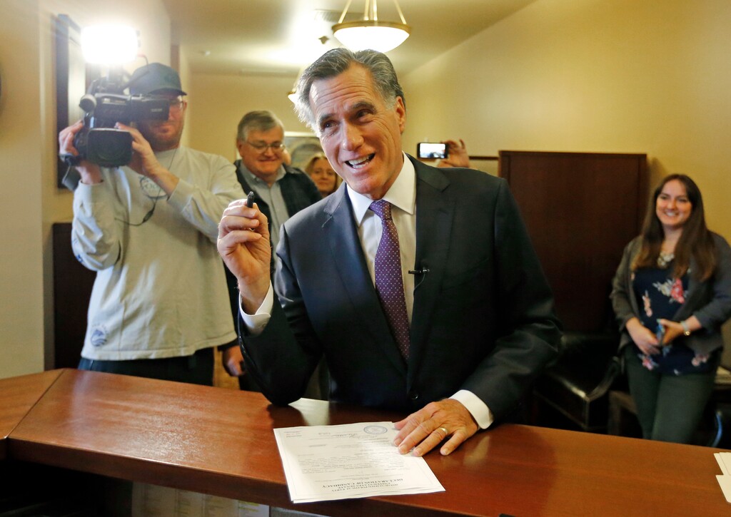 Former Republican presidential nominee Mitt Romney smiles as he declares his candidacy for the U.S. Senate at the state elections office Thursday, March 15, 2018, at the Utah State Capitol, in Salt Lake City. (AP Photo/Rick Bowmer)