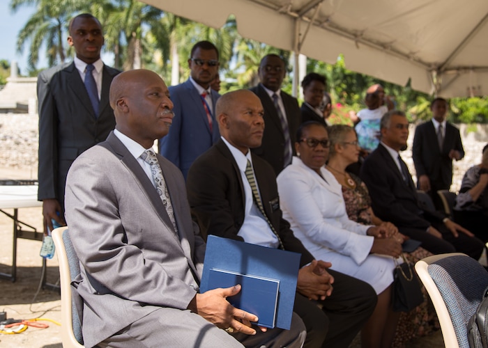 (Courtesy The Church of Jesus Christ of Latter-day Saints) Officials with The Church of Jesus Christ of Latter-day Saints broke ground on a temple in Port-au-Prince, Haiti, on Saturday. Petiion-Ville mayor Dominique Saint-Roc (left) and Karlyle Raphael, president of the Haiti Port-au-Prince LDS mission (center) attended the groundbreaking.