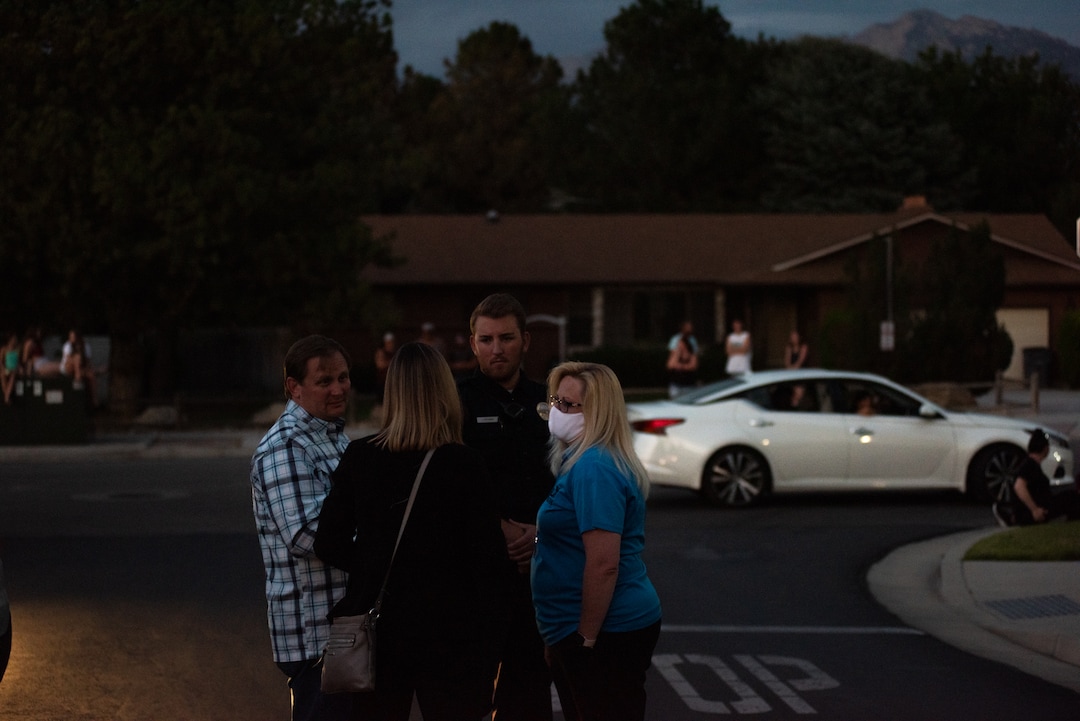 (Niki Chan Wylie |Special to The Tribune) Mayor Dawn Ramsey, right, speaks to officer Jeff Petersen, and city attorney Ryan Loose, left, outside of a home in South Jordan on Friday, July 24 where cops found explosive materials inside.