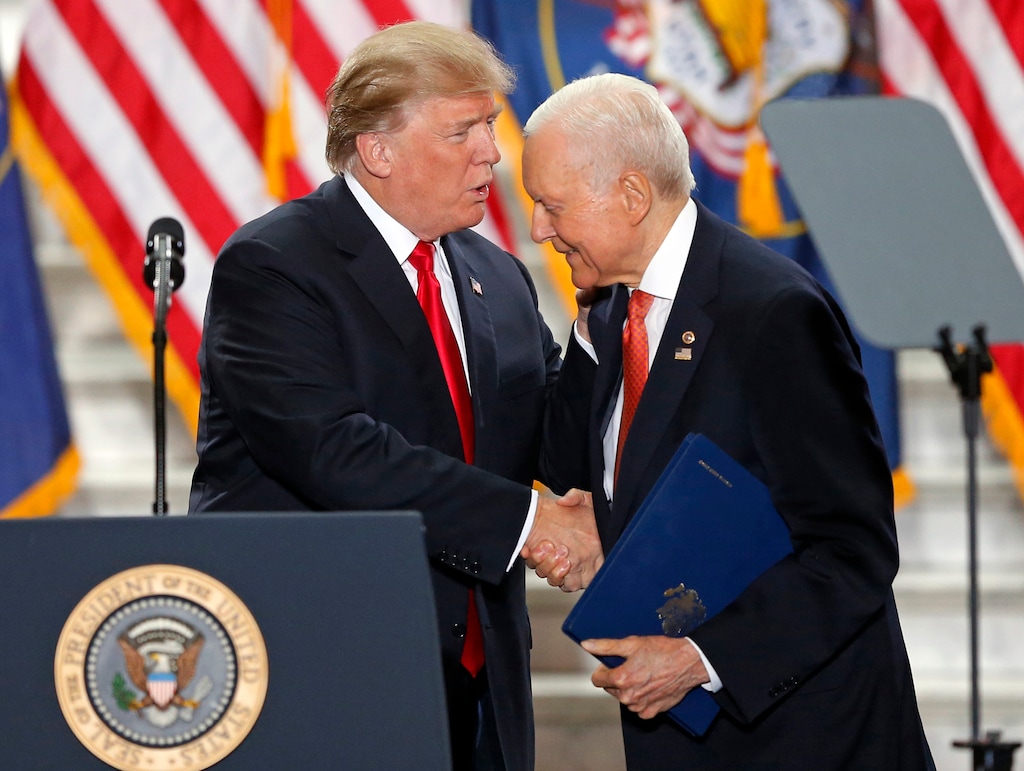 FILE - In this Dec. 4, 2017, file photo, President Donald Trump shakes Sen. Orrin Hatch, R-Utah, hand at the Utah State Capitol in Salt Lake City. Hatch says he will not seek re-election after serving more than 40 years in the U.S. Senate. Hatch, 83, says he’s always been a fighter, “but every good fighter knows when to hang up the gloves.” (AP Photo/Rick Bowmer, File)