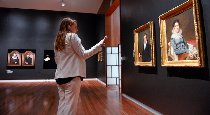 (Leah Hogsten  |  The Salt Lake Tribune) Utah Museum of Fine Art curator Leslie Anderson discusses the pendant format in the two portraits of Mr. David Austen and Mrs. David Austen, ca. 1811-1816, oil on canvas by Samuel Lovett Waldo. Anderson conceived and planned the new exhibit: "Power Couples: The Pendant Format in Art," open now through December 8, 2019. ÒPower Couples explores how artists have used the pendant format across media, cultures and time periods to explore gender roles and social status; to present moments of before-and-after, cause-and-effect and departure-and-return; and to compare and contrast familiar stories and ideas.Ó -UMFA