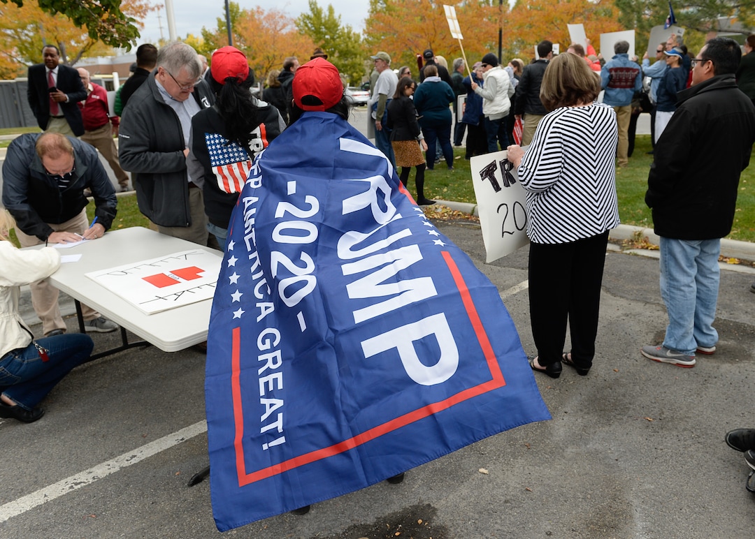 (Francisco Kjolseth | The Salt Lake Tribune) Two competing rallies spar near Rep. Ben McAdams' office in West Jordan, one seeking to support McAdams and one to criticize him for supporting the impeachment inquiry of President Donald Trump on Wednesday, Oct. 9, 2019.
