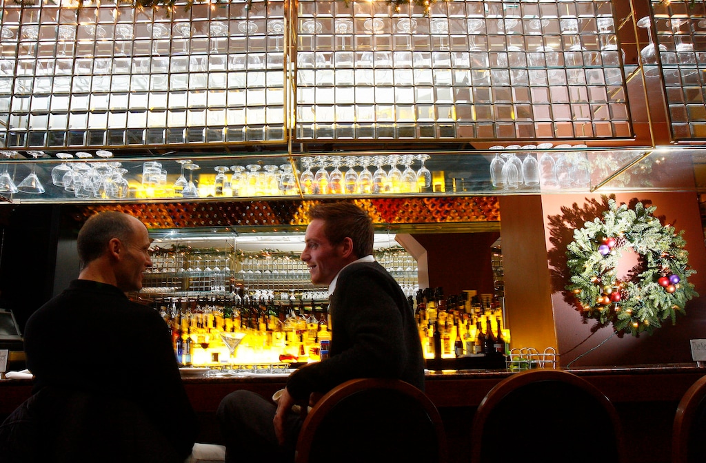 Chris Detrick  |  The Salt Lake TribuneIvan Saunders, left, and Dana Woodard, enjoy martini's at the bar in the New Yorker in downtown Salt Lake City in this photo from 2006.
