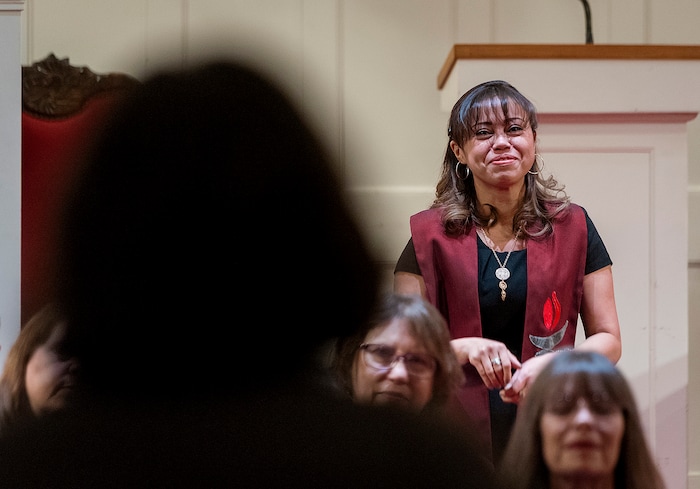 (Michael Mangum  |  Special to the Tribune)

Members of the congregation give Vicky Chavez, center, their well wishes, as Rev. Monica Dobbins, right, listens during a vigil held at First Unitarian Church in Salt Lake City, UT on Wednesday, January 30th, 2019. The vigil marked the one-year anniversary of when Chavez came to the church with her children seeking sanctuary from deportation.
