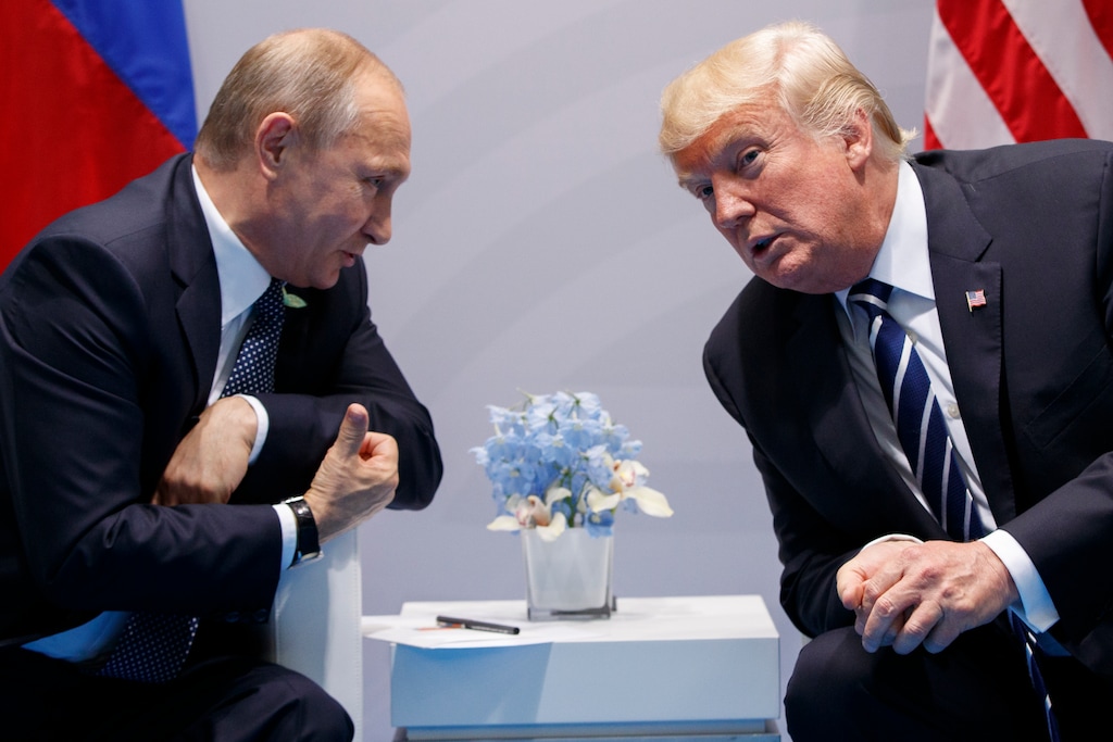 FILE - In this July 7, 2017, file photo, U.S. President Donald Trump meets with Russian President Vladimir Putin at the G-20 Summit in Hamburg. (AP Photo/Evan Vucci, File)