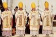 (Baz Ratner | AP) Newly consecrated bishops — Marc Hanappier, left, Michel Poinsinet de Sivry, Michael Goldade and Pascal Schreiber — by the Society of St. Pius X, in defiance of the Vatican, in Écône, Switzerland, on Wednesday, July 1, 2026.