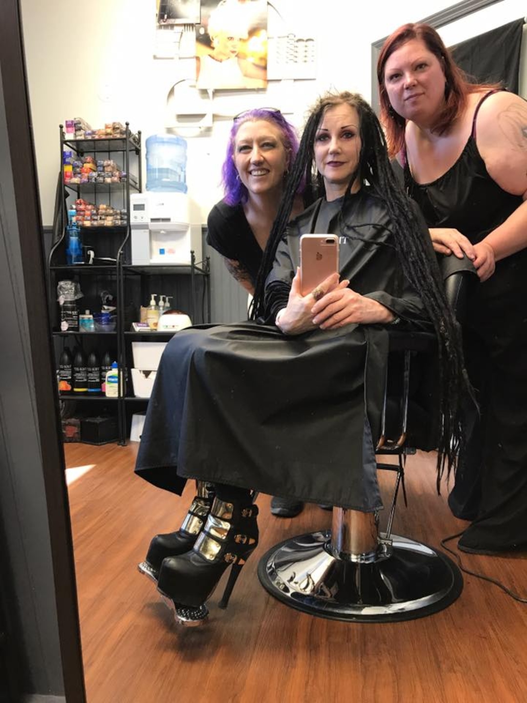 (Courtesy photo) Tracy Painter, left, and Cinamon Hadley, center, about to get their heads shaved in solidarity, due to Hadley's chemo treatments.