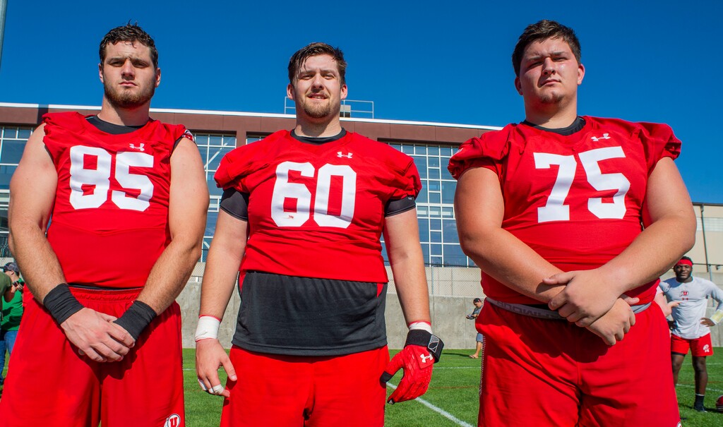 (Rick Egan  |  The Salt Lake Tribune)   University of Utah Head offensive linemen, Hunter Thedford (85) Noah Osur-Myers (60), and Alex Locklear (75), after practice, Thursday, Aug. 1, 2019.