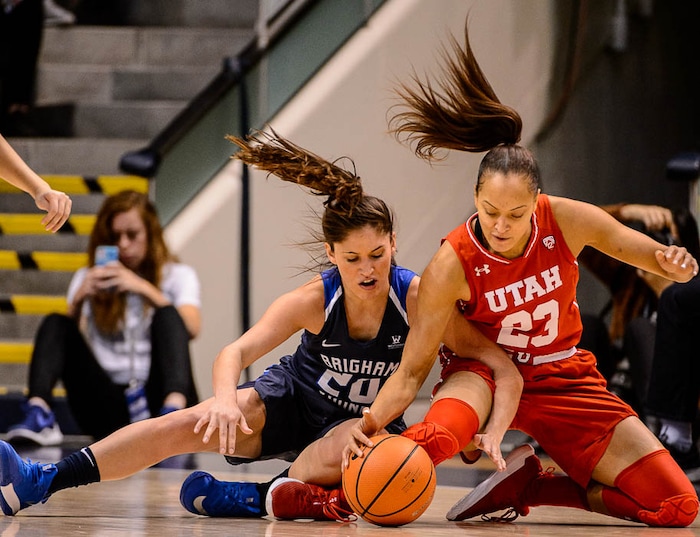 (Trent Nelson | The Salt Lake Tribune)  Brigham Young Cougars guard Cassie Broadhead Devashraye (20) and Utah Utes guard/forward Daneesha Provo (23) as BYU hosts Utah, NCAA women's basketball in Provo, Saturday December 9, 2017.