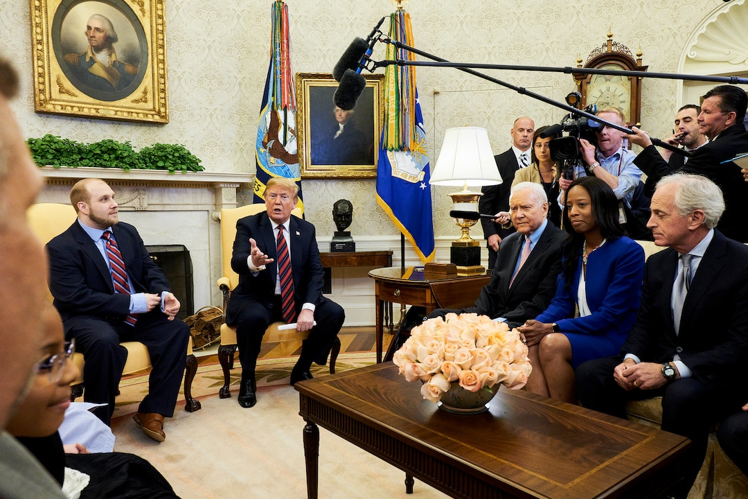 (T.J. Kirkpatrick | The New York Times) President Donald Trump joins Joshua Holt, an American who had been held in prison in Venezuela for two years, in the Oval Office of the White House in Washington, May 26, 2018. At right: Sen. Orrin Hatch, R-Utah; Rep. Mia Love,R-Utah; and Sen. Bob Corker, R-Tenn.