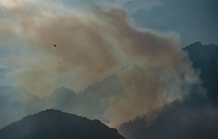 (Francisco Kjolseth  |  The Salt Lake Tribune) Crews battle a fire in Neffs Canyon on the north side of Mount Olympus on Tuesday, Sept, 22, 2020, that started the night before.