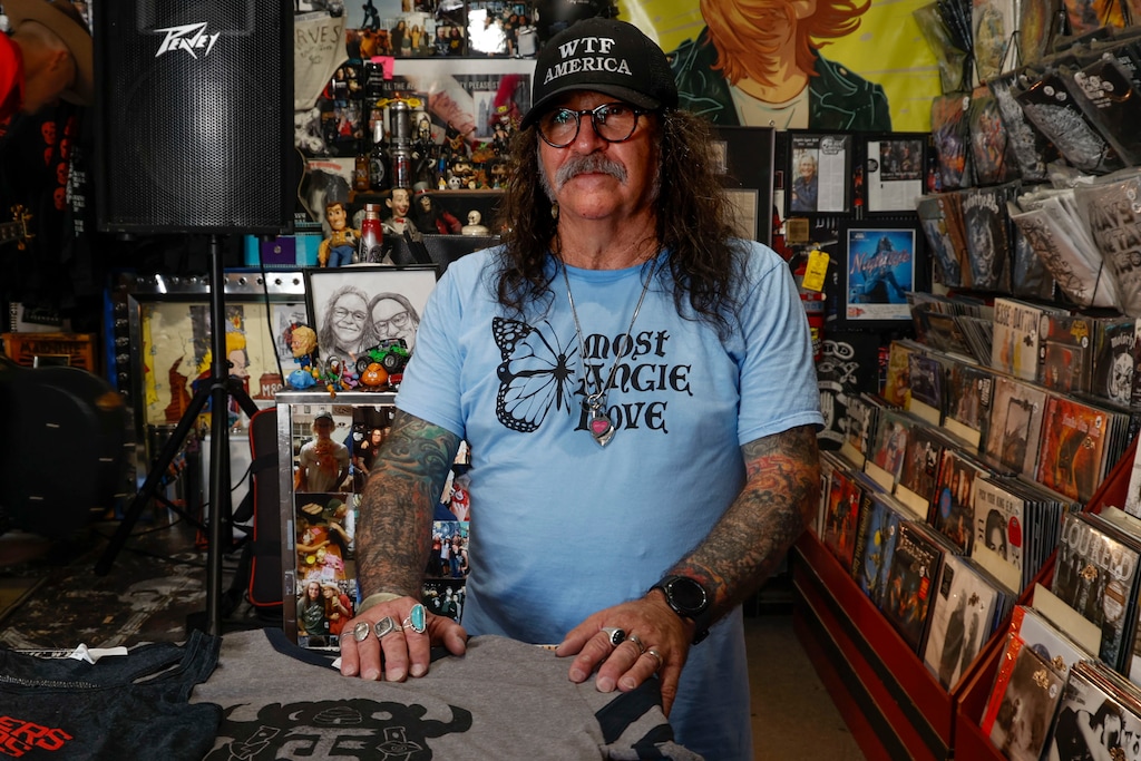 (Michael Brandy | Special to The Tribune) Kevin Kirk, the owner of the Heavy Metal Shop, poses for a photo during the store’s 35th anniversary party in Salt Lake City, Sunday, July 17, 2022.