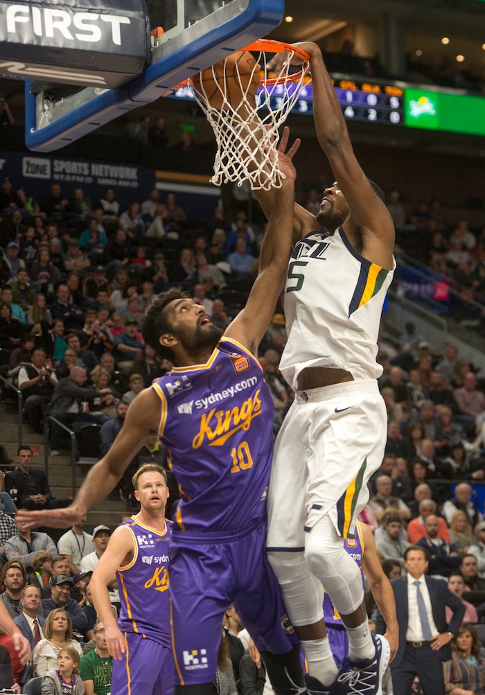 (Rick Egan  |  The Salt Lake Tribune) Utah Jazz forward Derrick Favors (15) dunks the ball over Sydney Kings center, Amritpal Singh, (10), in preseason basketball Utah Jazz vs.Sydney Kings, in Salt Lake City, Sunday, October 2, 2017.


