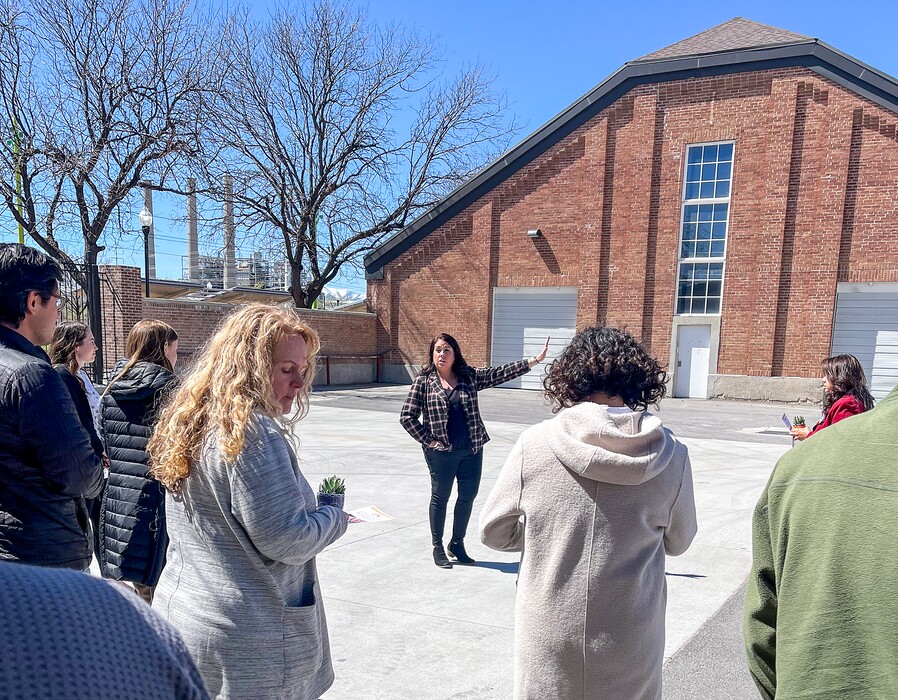 (Stefene Russell  |  The Salt Lake Tribune) Nicki Claeys, programs director at the Utah State Fairpark, gives attendees a tour on Wednesday, April 6, 2022, during a news conference announcing the May 28 launch of the Fairpark’s International Market.