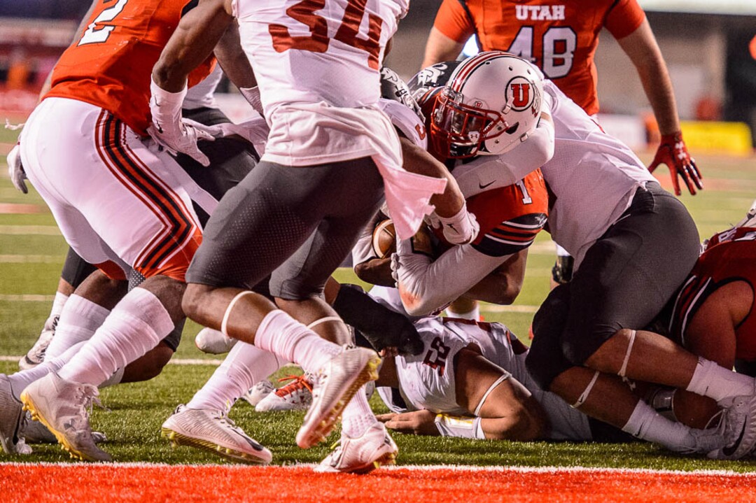 (Trent Nelson | The Salt Lake Tribune)  Utah Utes quarterback Tyler Huntley (1) runs and is stopped at the goal line as the University of Utah hosts Washington State, NCAA football in Salt Lake City, Saturday November 11, 2017.