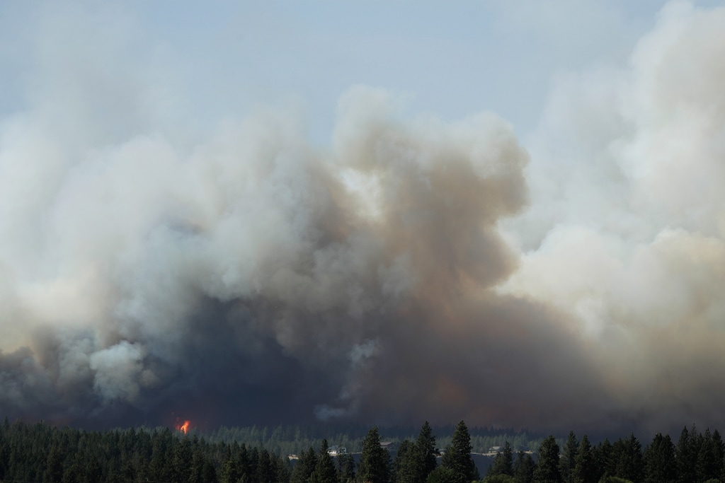 (Young Kwak | AP) The Old Trails Fire is seen in Spokane, Wash., Saturday, Aug. 1, 2026,