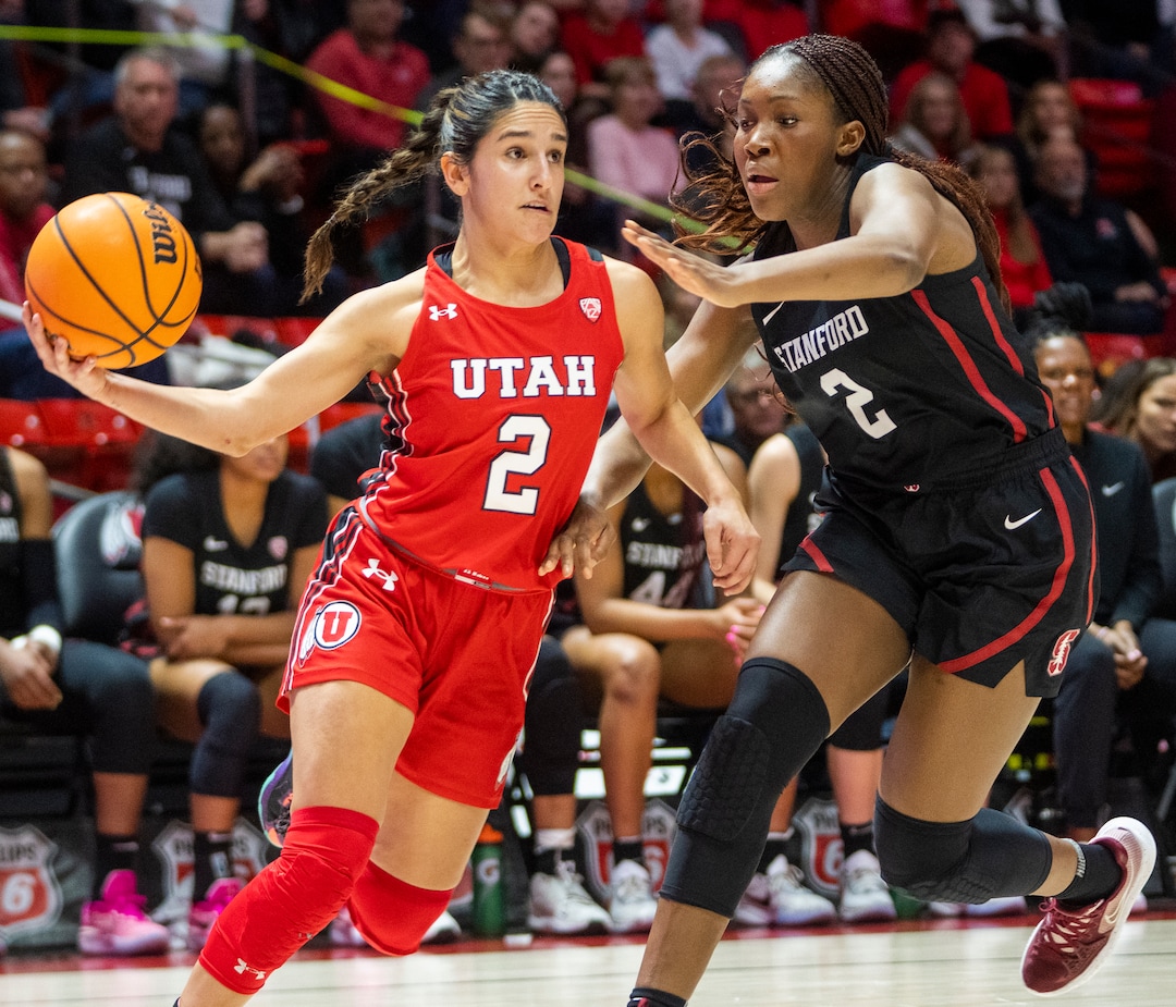 (Rick Egan | The Salt Lake Tribune) Utah Utes guard Ines Vieira (2) is guarded by Stanford Cardinal guard Agnes Emma-Nnopu (2), in PAC-12 action, at the Jon M. Huntsman Center, on Saturday, Feb. 25, 2023.