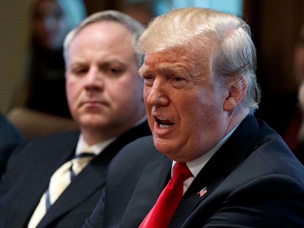 (Evan Vucci | The Associated Press) President Donald Trump, with acting Secretary of the Interior David Bernhardt, left, speaks during a cabinet meeting at the White House in Washington. The chairman of the U.S. House Natural Resources Committee is calling on the Interior Department to halt work on oil and gas development permits and leases in Alaska and elsewhere during the partial government shutdown. A letter from U.S. Rep. Raul Grijalva, D-Ariz., to Bernhardt objects to the Interior Department allowing work to be done on upcoming offshore lease sales, seismic permits and a five-year offshore oil and gas leasing plan.
