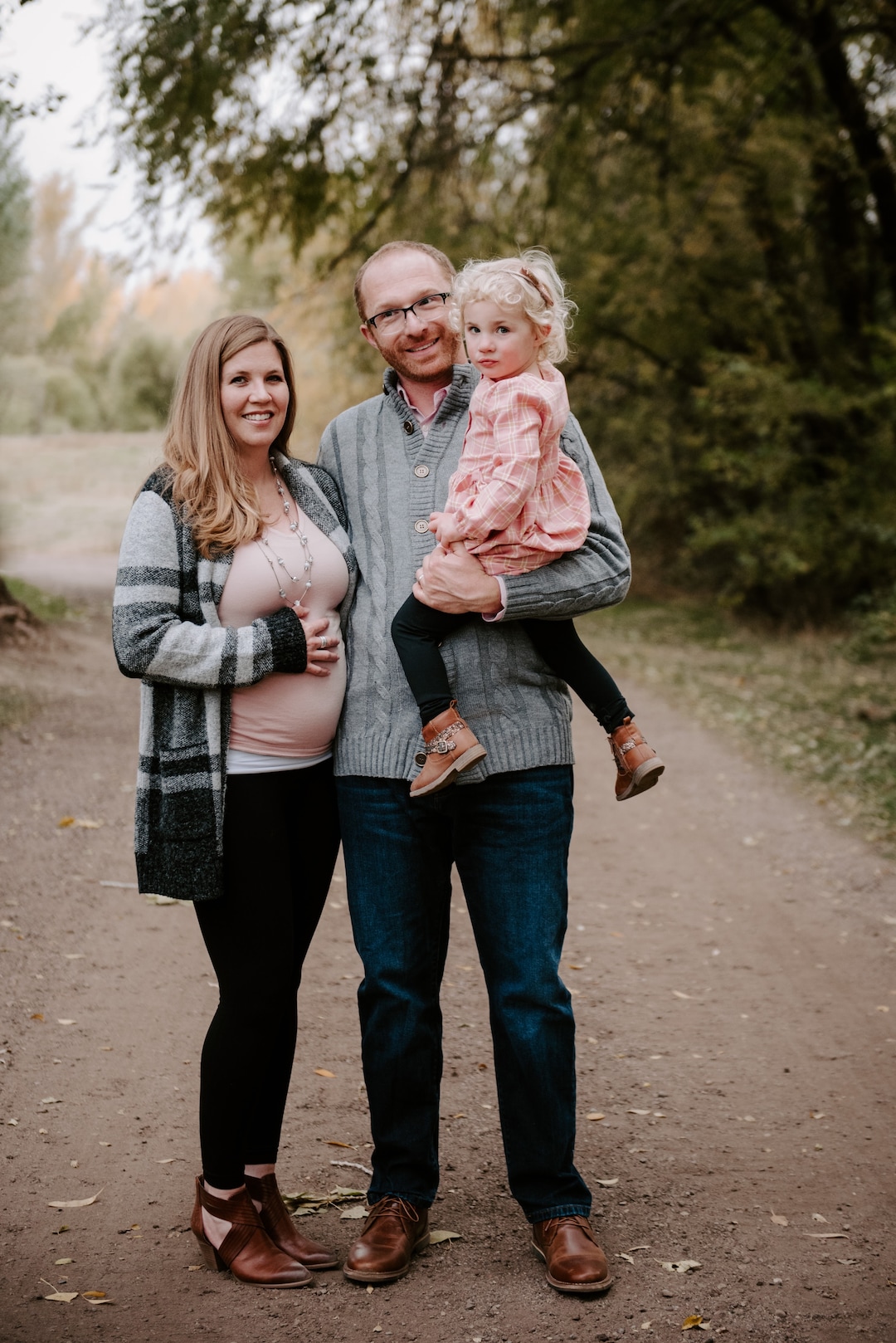 (Photo Courtesy of Alex Adams) Pictured is Damon and Tarah Bryan and their daughter, Ainsley.