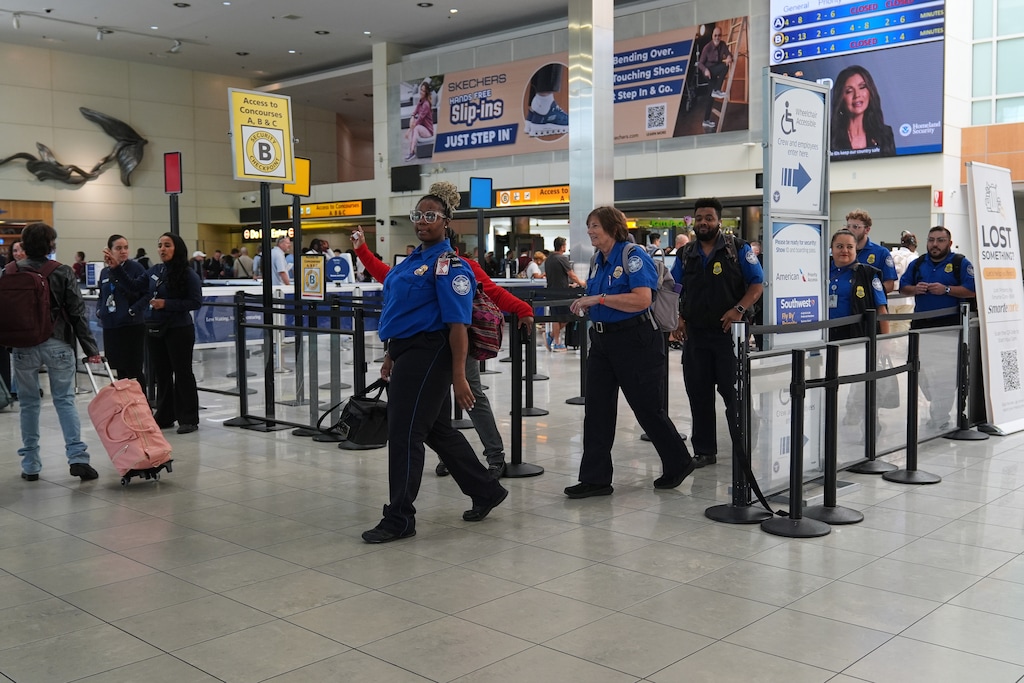 (Stephanie Scarbrough | AP) Transportation Security Administration employees leave a security checkpoint during a shift change at Baltimore/Washington International Thurgood Marshall Airport, Thursday, Oct. 2, 2025, in Baltimore.