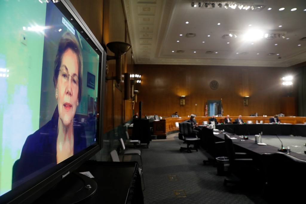 (Andrew Harnik | AP photo)
In this May 7 photo, Sen. Elizabeth Warren, D-Mass., speaks via teleconference during a Senate Health Education Labor and Pensions Committee hearing on new coronavirus tests on Capitol Hill in Washington. The coronavirus is reaching into the lives of Congress as lawmakers debate the nation's recovery. Massachusetts Sen. Elizabeth Warren's brother died from the virus. Florida congressman Mario Diaz-Balart contracted it.