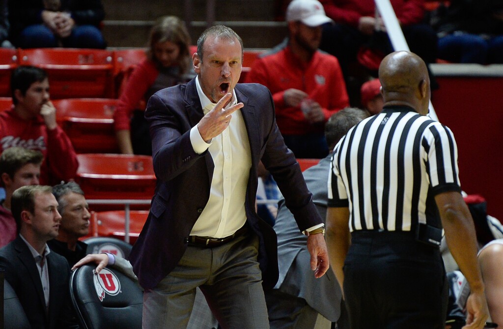 (Francisco Kjolseth  |  The Salt Lake Tribune)  Utah head coach Larry Krystkowiak argues a call against Northern Arizona in Men's Basketball at the Jon M Huntsman Center in Salt Lake City, Utah, on Friday, Dec. 21, 2018.