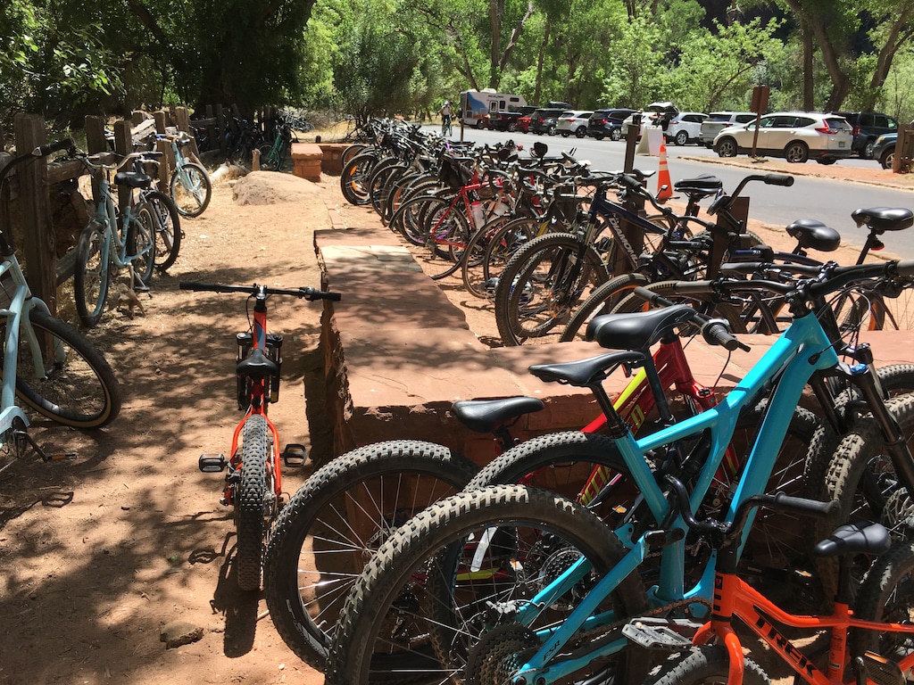 (Photo courtesy of Zion National Park) Up to 400 bikes are parked at the Temple of Sinawava, a popular trailhead in Zion National Park. Since the park's reopening May 13, bicycling has become a popular way to tour Zion Canyon in the absence of the park's shuttle service. Starting July 1, cars will be barred from the canyon as the shuttle service resumes using modified buses to enable social distance. Reservations will be required.