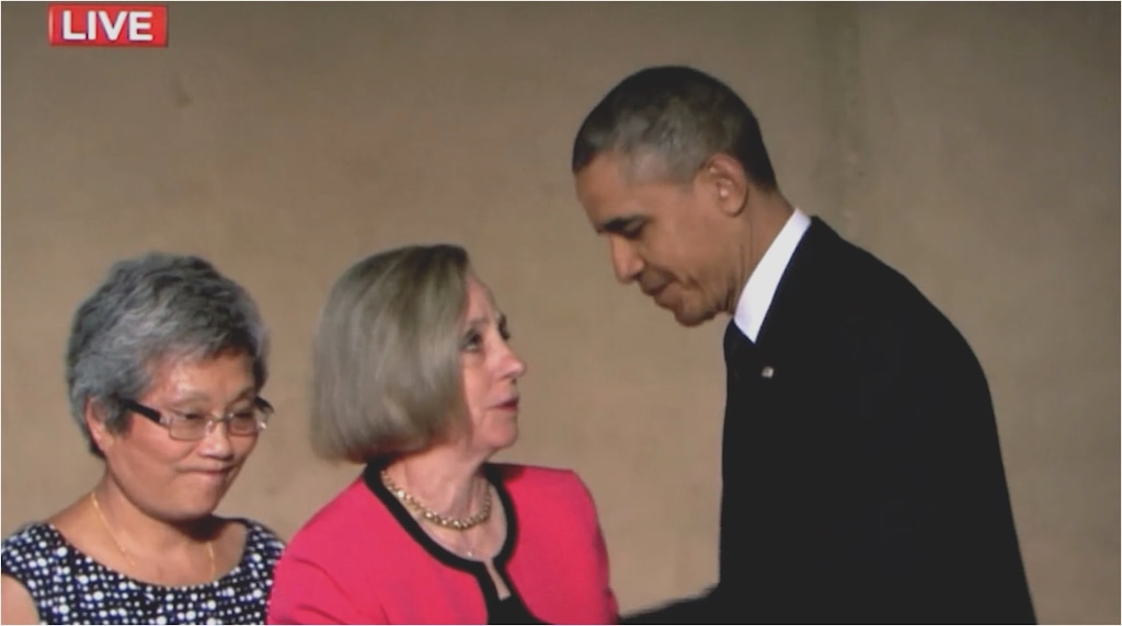 ( Courtesy photo) At the dedication of the 9/11 Memorial and Museum in New York in 2014, President Barack Obama (right) greets Ling Young (left), a survivor of the south tower of the World Trade Center, and Alison Crowther, whose son Welles was credited with saving Young and other survivors. The moment is show in the documentary "Man in Red Bandana," which chronicles Welles Crowther's heroism.