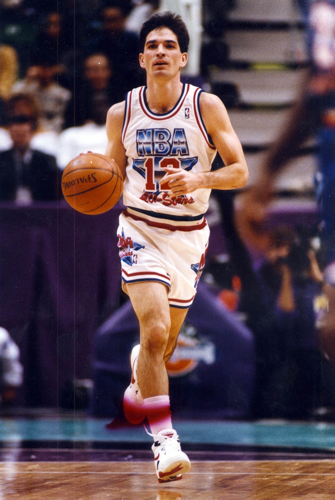 (Tribune file photo) John Stockton brings the ball down court during the 1993 NBA All-Star Game at the Delta Center. Stockton and Jazz teammate Karl Malone were named co-MVPs of the game.