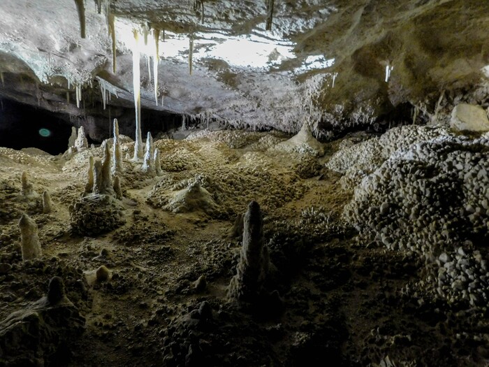 Erin Alberty  |  The Salt Lake TribuneCalcite formations rise from the floor and hang from the ceiling of Crystal Ball Cave in Gandy, Utah.