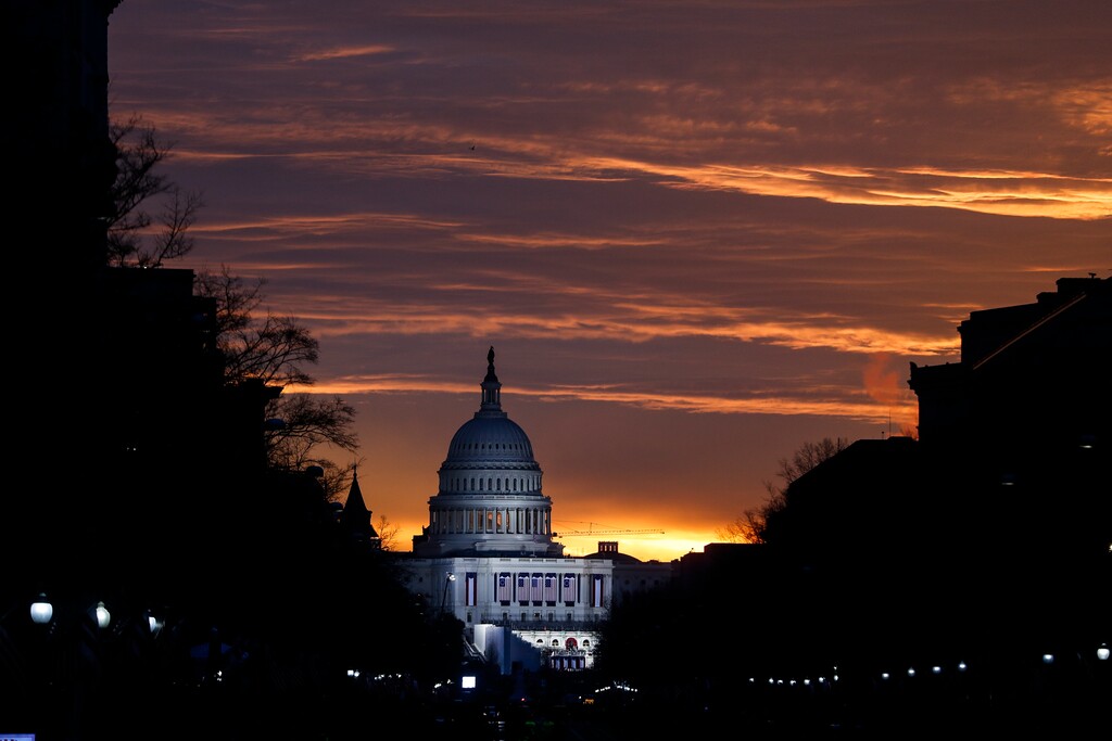 In this Friday, Jan. 20, 2017 file photo, the U.S. Capitol Building is illuminated during sunrise in Washington.  (AP Photo/John Minchillo)