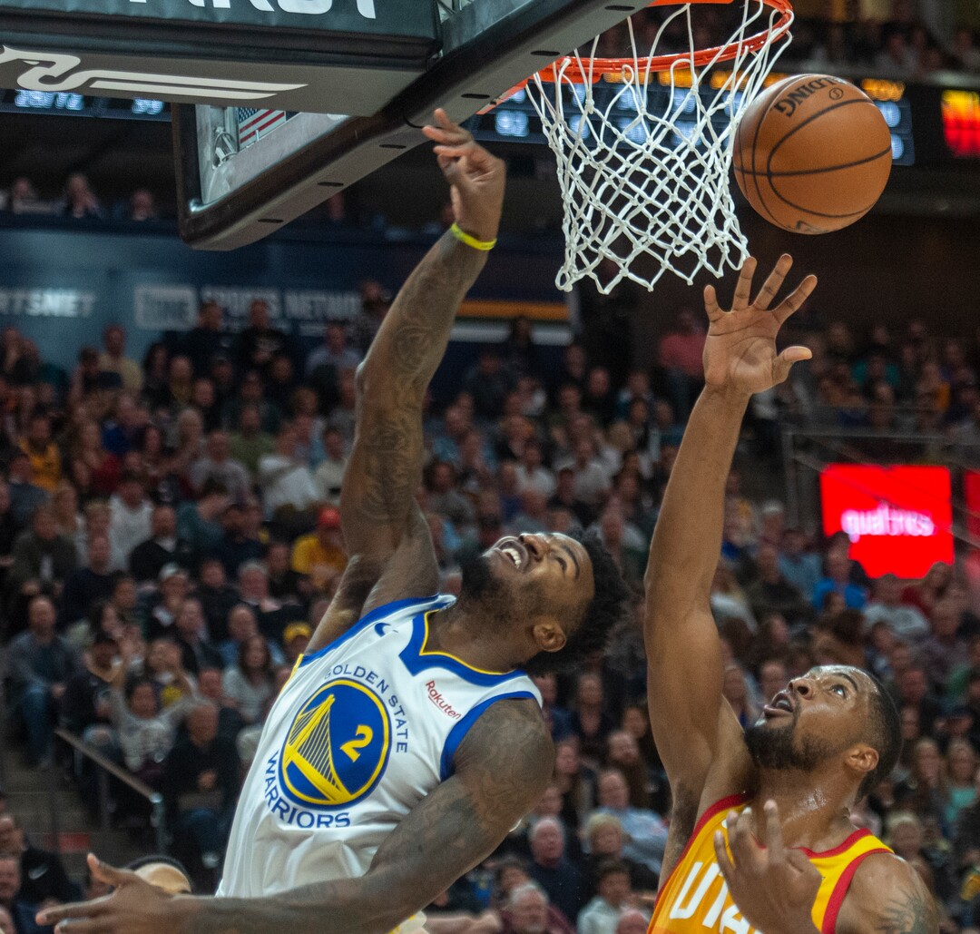 (Rick Egan  |  The Salt Lake Tribune)  Utah Jazz forward Derrick Favors (15) blocks a shot by Golden State Warriors forward Jordan Bell (2), in NBA action between Utah Jazz and Golden State Warriors, in Salt Lake City, Wednesday, Dec. 19, 2018.