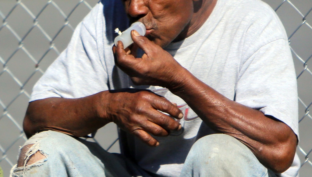 Francisco Kjolseth  |  The Salt Lake Tribune
Drug use among the homeless is rampant and in plain sight along 400 West near the Road Home shelter as people try to cope with a number of issues. Joel Hunt, a physician's assistant at the 4th Street Clinic, treats the homeless and does outreach as he tries to talk to people with substance abuse problems and other medical issues.