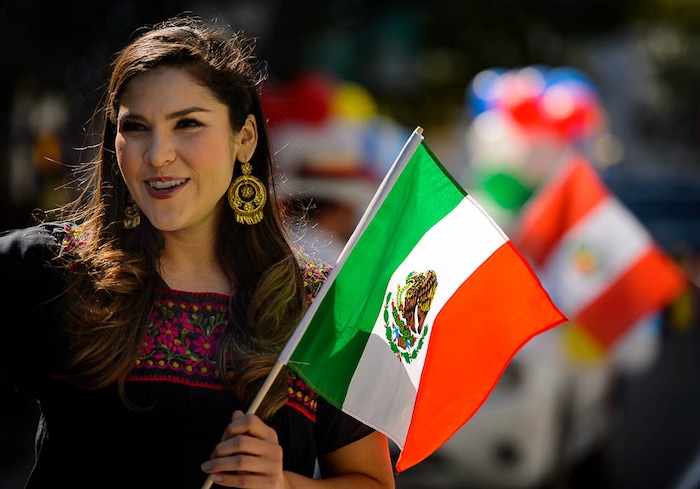 (Trent Nelson | The Salt Lake Tribune)
The national flag of Mexico in the third annual Hispanic Heritage Parade and Street Festival in Salt Lake City, Saturday Sept. 22, 2018.
