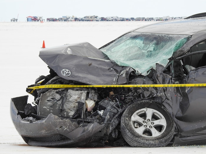 (Francisco Kjolseth | The Salt Lake Tribune) Utah's Bonneville Salt Flats turned deadly on the sidelines of Speed Week following a head-on collision between two vehicles carrying support crew traveling between the pits and the entrance to the salt along the access road on Wednesday, Aug. 16, 2017. One person was killed and five injured, all of whom were said to be members of support crews for racing drivers.