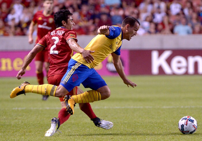 (Leah Hogsten  |  The Salt Lake Tribune)  Real Salt Lake defender Tony Beltran (2) and Colorado Rapids midfielder Luis Gil fight for possession.  Real Salt Lake are 2-0 against the Colorado Rapids for the Rocky Mountain Cup at Rio Tinto Stadium, Saturday, August 26, 2017. 