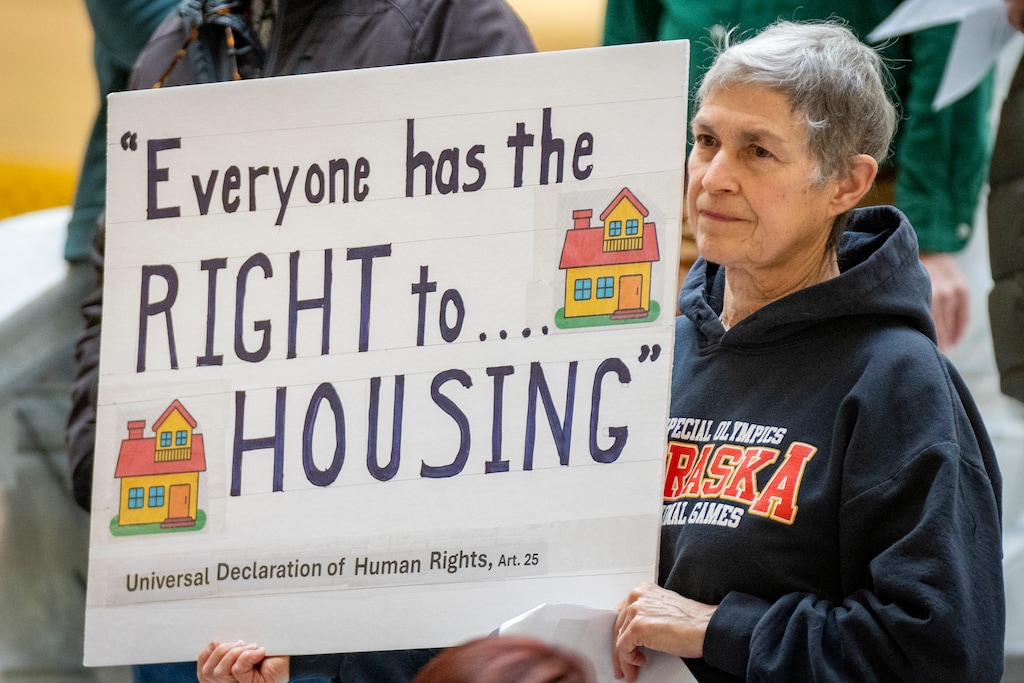 (Rick Egan | The Salt Lake Tribune) Linda Smith joins protesters in the Capitol rotunda for a rally for housing and services to end homelessness, on Thursday, Jan 15, 2026.