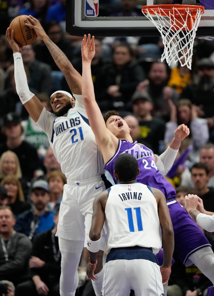 (Francisco Kjolseth  |  The Salt Lake Tribune)Utah Jazz center Walker Kessler (24) loses the rebound attempt to Dallas Mavericks center Daniel Gafford (21) during an NBA basketball game Monday, March 25, 2024, in Salt Lake City.