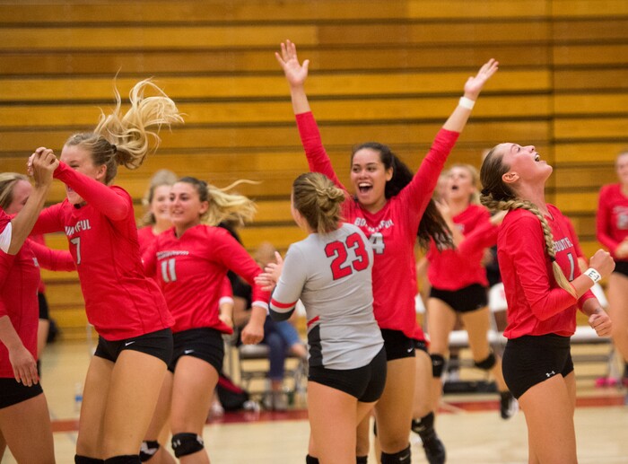 (Rick Egan  |  The Salt Lake Tribune) Bountiful celebrates the final score, in their  come from behind win over Skyridge, after losing the first two games, at Bountiful High, Wednesday, September 6, 2017.