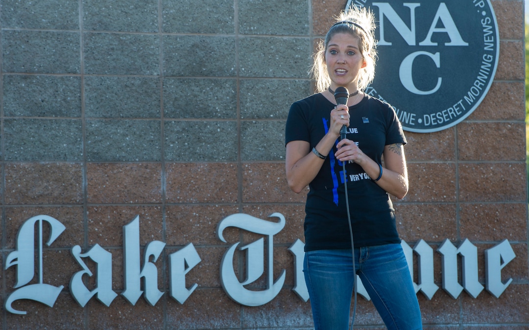 (Rick Egan  |  The Salt Lake Tribune)     Skye Christensen speaks to police supporters upset by a Pat Bagley cartoon, as they protest The Salt Lake Tribune in West Valley City, on Thursday, Sept. 3, 2020.