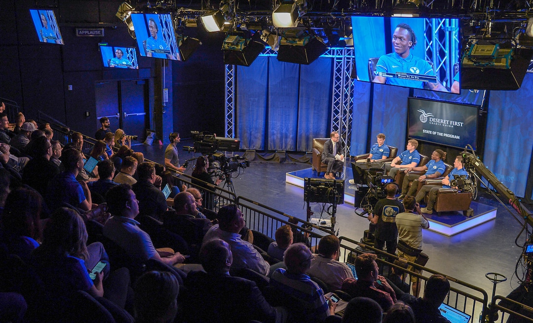 (Francisco Kjolseth  |  The Salt Lake Tribune)  Defensive back Dayan Ghanwoloku is projected on the screen as he joins other players during a live broadcast on BYUTV during BYU football media day at the BYU Broadcasting Building in Provo on Tuesday, June 18, 2019.