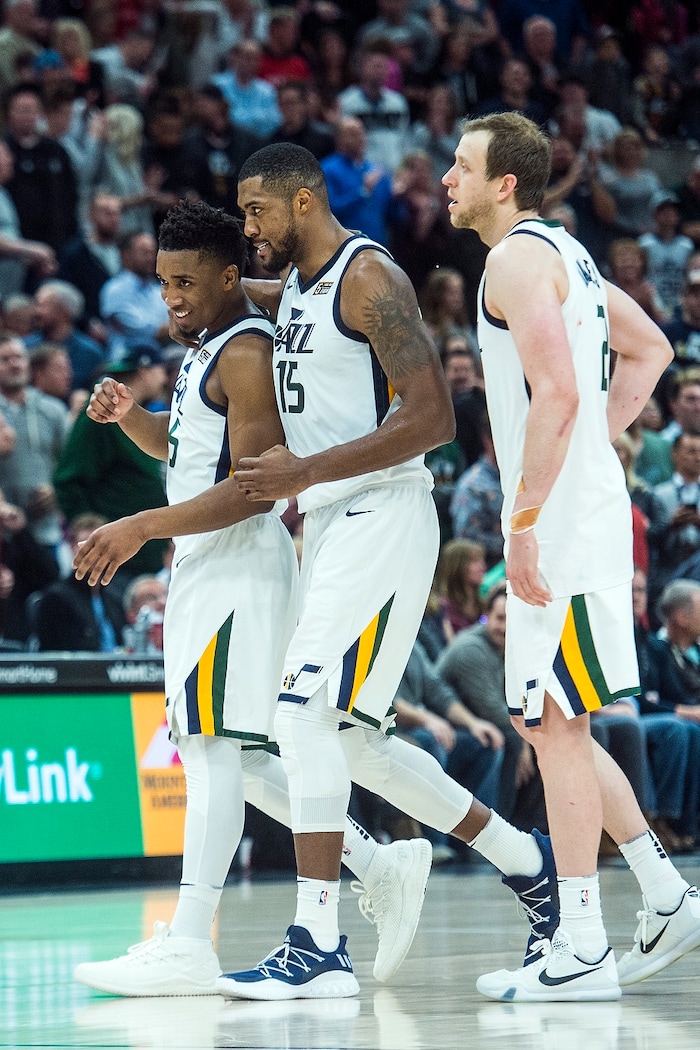 (Chris Detrick  |  The Salt Lake Tribune)  Utah Jazz guard Donovan Mitchell (45) Utah Jazz forward Derrick Favors (15) and Utah Jazz forward Joe Ingles (2) during the game at Vivint Smart Home Arena Friday, December 1, 2017.  Utah Jazz defeated New Orleans Pelicans 114-108.