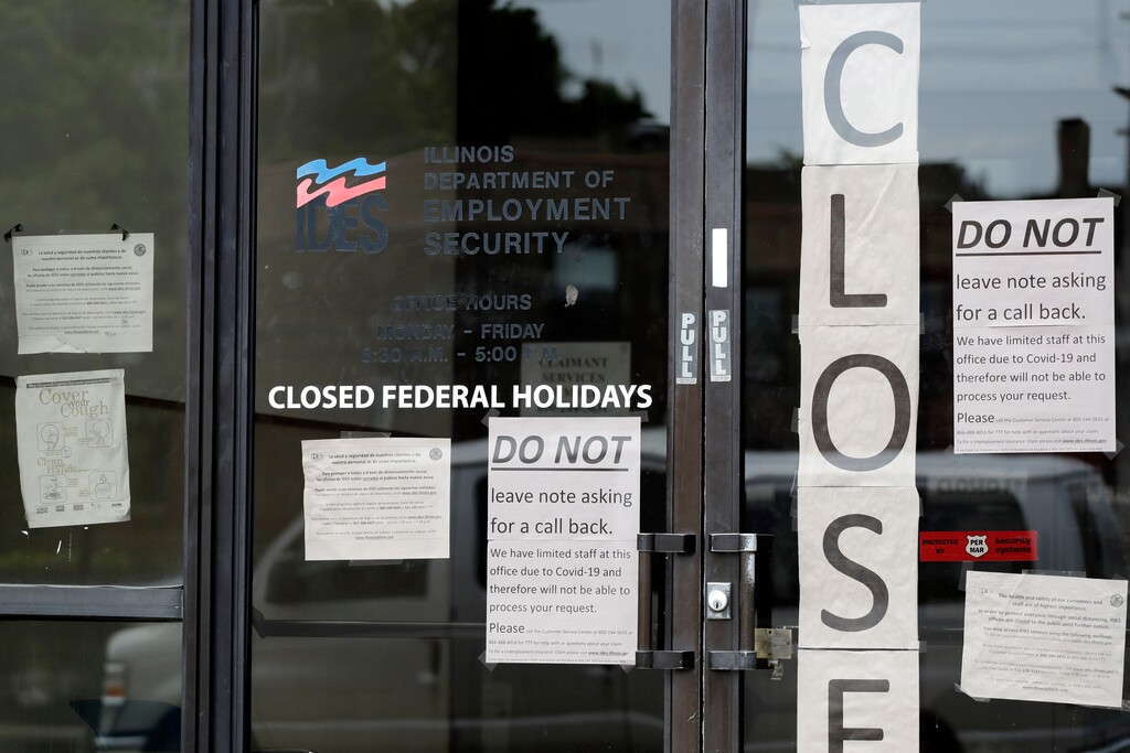 (Nam Y. Huh | AP photo)

In this June 5, 2020, file photo, information signs are posted at the Illinois Department of Employment in Chicago.