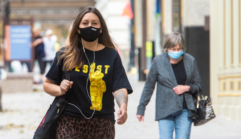 (Rick Egan | The Salt Lake Tribune). Shoppers wear masks as they shop in downtown Salt Lake City on Friday, Nov. 6, 2020.