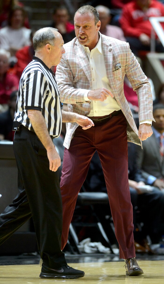 (Steve Griffin  |  The Salt Lake Tribune) University of Utah head coach Larry Krystkowiak storms onto the court after a foul was called on his team during the Utah versus UC Davis men's NIT basketball game at the Huntsman Center in Salt Lake City Wednesday March 14, 2018. Krystkowiak was ejected from the game.