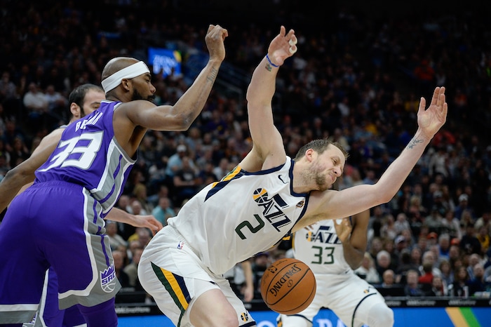 (Francisco Kjolseth  |  The Salt Lake Tribune)  Utah Jazz forward Joe Ingles (2) is fouled as the Utah Jazz host the Sacramento Kings in their NBA game at Vivint Smart Home Arena Friday, April 5, 2019, in Salt Lake City.