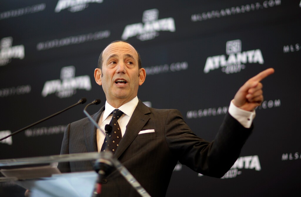 FILE - In this April 16, 2014, file photo, Major League Soccer Commissioner Don Garber speaks during a news conference in Atlanta, announcing the city will be getting an MLS expansion team.  Garber, speaking with the Associated Press Sports Editors on Thursday, April 21, 2016, says St. Louis and Sacramento, California, are the leading candidates for the next round of expansion.(AP Photo/David Goldman, File)