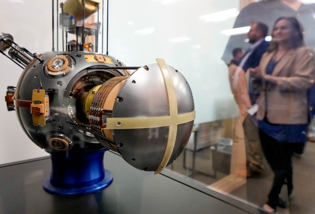 (Francisco Kjolseth | The Salt Lake Tribune) An Advanced Inertial Reference Sphere (AIRS) with Floated Inertial Measurement Ball (FLIMBAL) navigation system is on display at Draper, a major engineering firm from Cambridge, Mass., opening a campus in Clearfield, on Tuesday, April 23, 2024. The company has a decades-long partnership with the U.S Air Force at Hill Air Force Base, and has plans for Utah in sectors including biotechnology, electronic systems, space systems and national security.